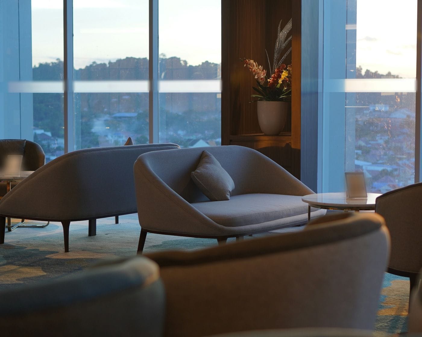 A quiet lounge with a sunset view: the kind of rest a Highway Haven offers while your vehicle charges